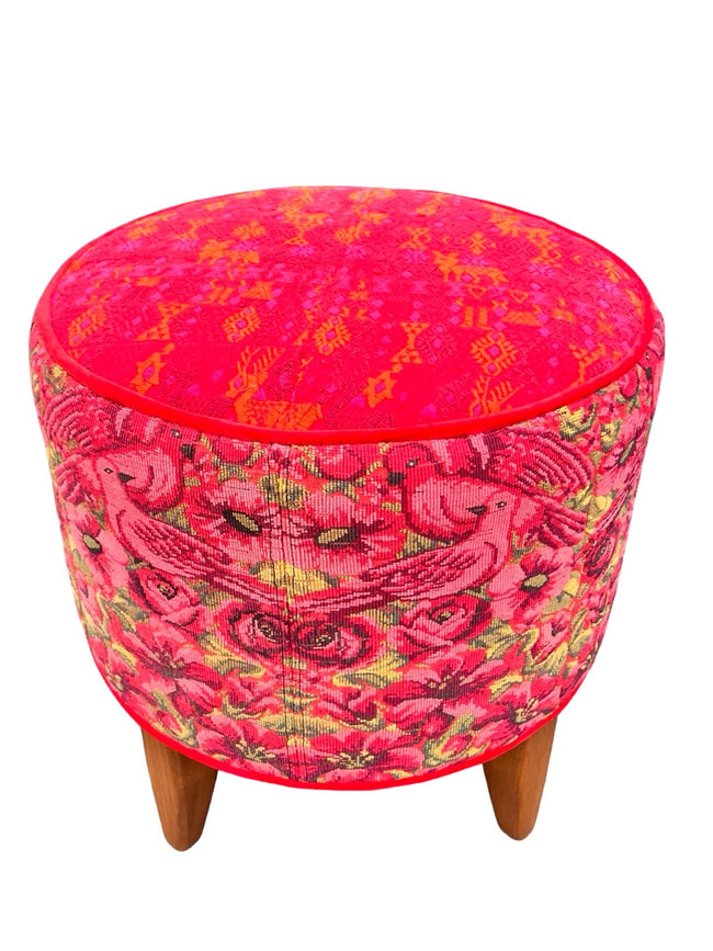 Round footstool upholstered in colorful Guatemalan huipil with vibrant red Belgian velvet piping- FolkProject