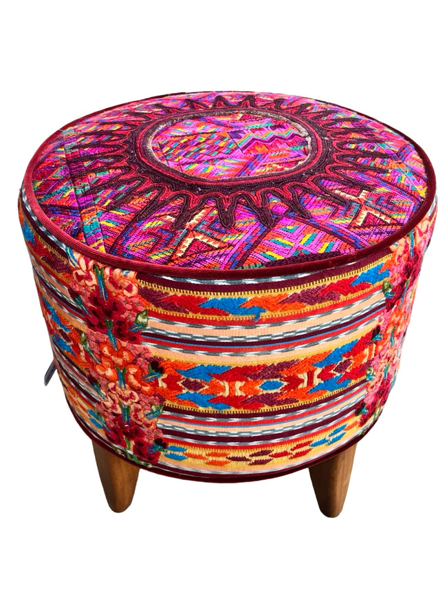 Iraci multicolor round footstool upholstered in colorful Mexican and Guatemalan huipiles with  velvet piping - FolkProject