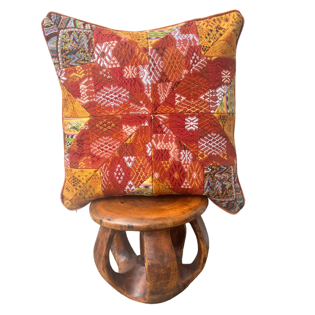 Handcrafted pillow made from colorful huipil remnants in a radial starburst pattern. - FolkProject