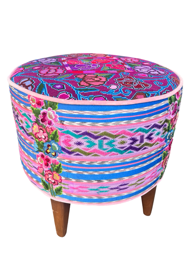Iraci Azul round footstool upholstered in colorful Mexican and Guatemalan huipiles with pink velvet piping - FolkProject