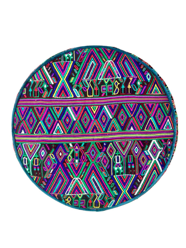 Round footstool upholstered in a colorful Guatemalan corte with teal Belgian velvet piping - FolkProject