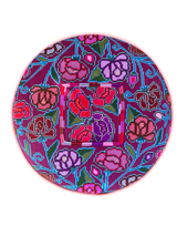 Iraci Azul round footstool upholstered in colorful Mexican and Guatemalan huipiles with pink velvet piping - FolkProject