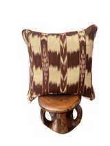 Handcrafted pillow made from colorful huipil remnants in a radial starburst pattern.- FolkProject