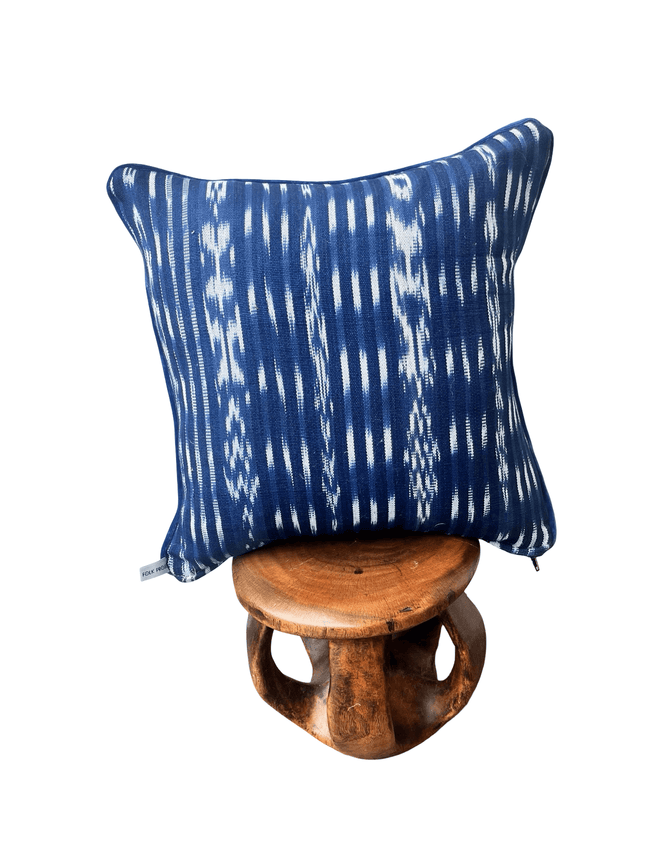 Handcrafted pillow made from colorful huipil remnants in a radial starburst pattern. - FolkProject