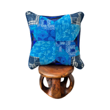 Handcrafted pillow made from colorful huipil remnants in a radial starburst pattern - FolkProject