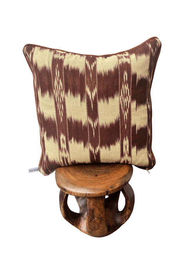 Handcrafted pillow made from colorful huipil remnants in a radial starburst pattern. - FolkProject