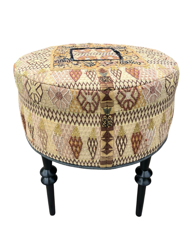 Magdalena wingback chair and ottoman Ottoman low-angle view - FolkProject