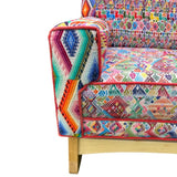 Malia handcrafted rocking chair upholstered in colorful Guatemalan huipil, corte, and handwoven ikat textiles. - FolkProject