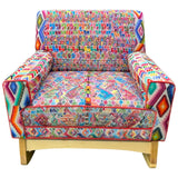 Malia handcrafted rocking chair upholstered in colorful Guatemalan huipil, corte, and handwoven ikat textiles. - FolkProject