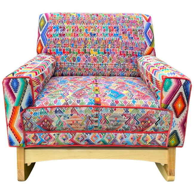 Malia handcrafted rocking chair upholstered in colorful Guatemalan huipil, corte, and handwoven ikat textiles. - FolkProject