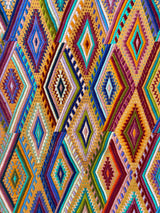 Chichi Apricot handwoven brocade table runner crafted by Maya artisans in Chichicastenango, Guatemala.- FolkProject