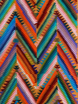 Chichi Apricot handwoven brocade table runner crafted by Maya artisans in Chichicastenango, Guatemala. - FolkProject